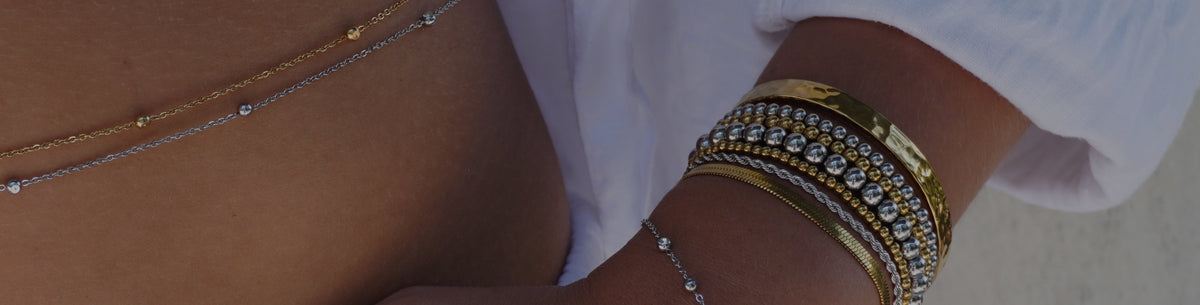 Gold and silver mixed metal bracelets by ALCO Jewelry