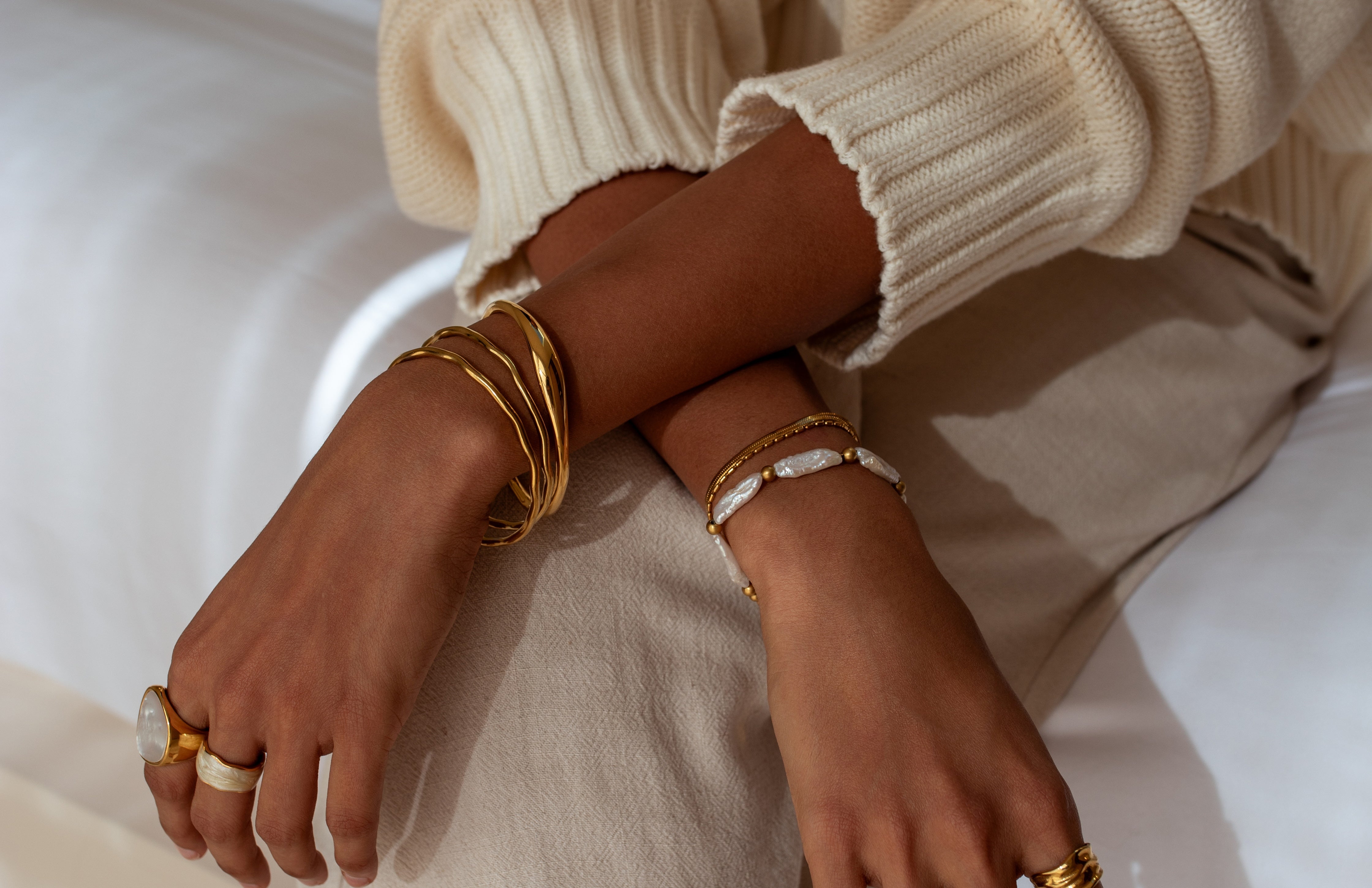 Gold water resistant bracelets and cuffs by ALCO Jewelry
