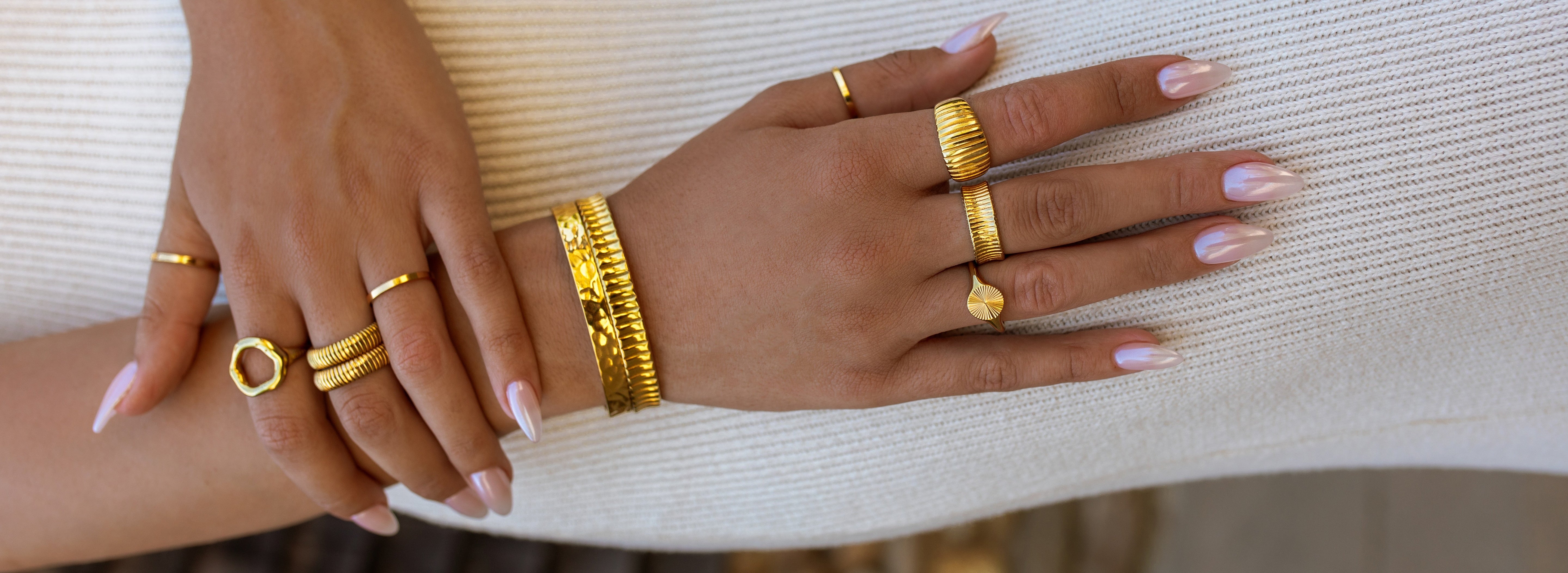 Gold water resistant matching rings and bracelets by ALCO Jewelry