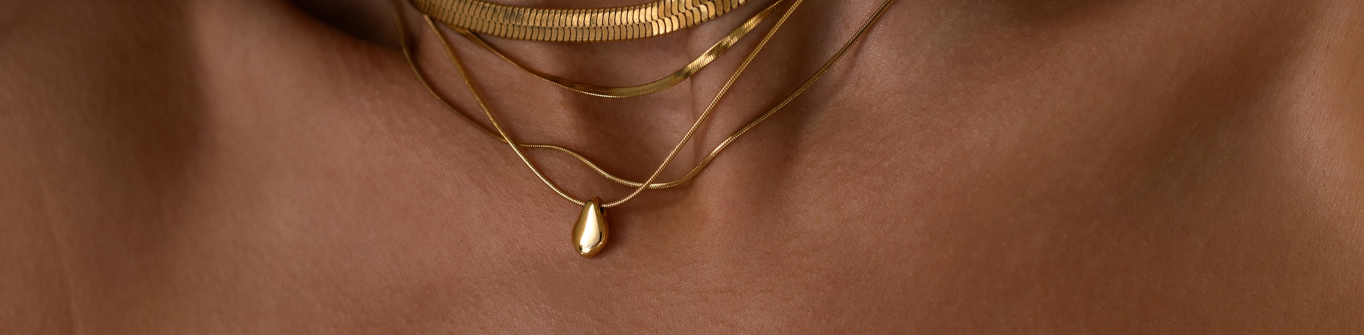 Simple dainty gold necklaces by ALCO Jewelry